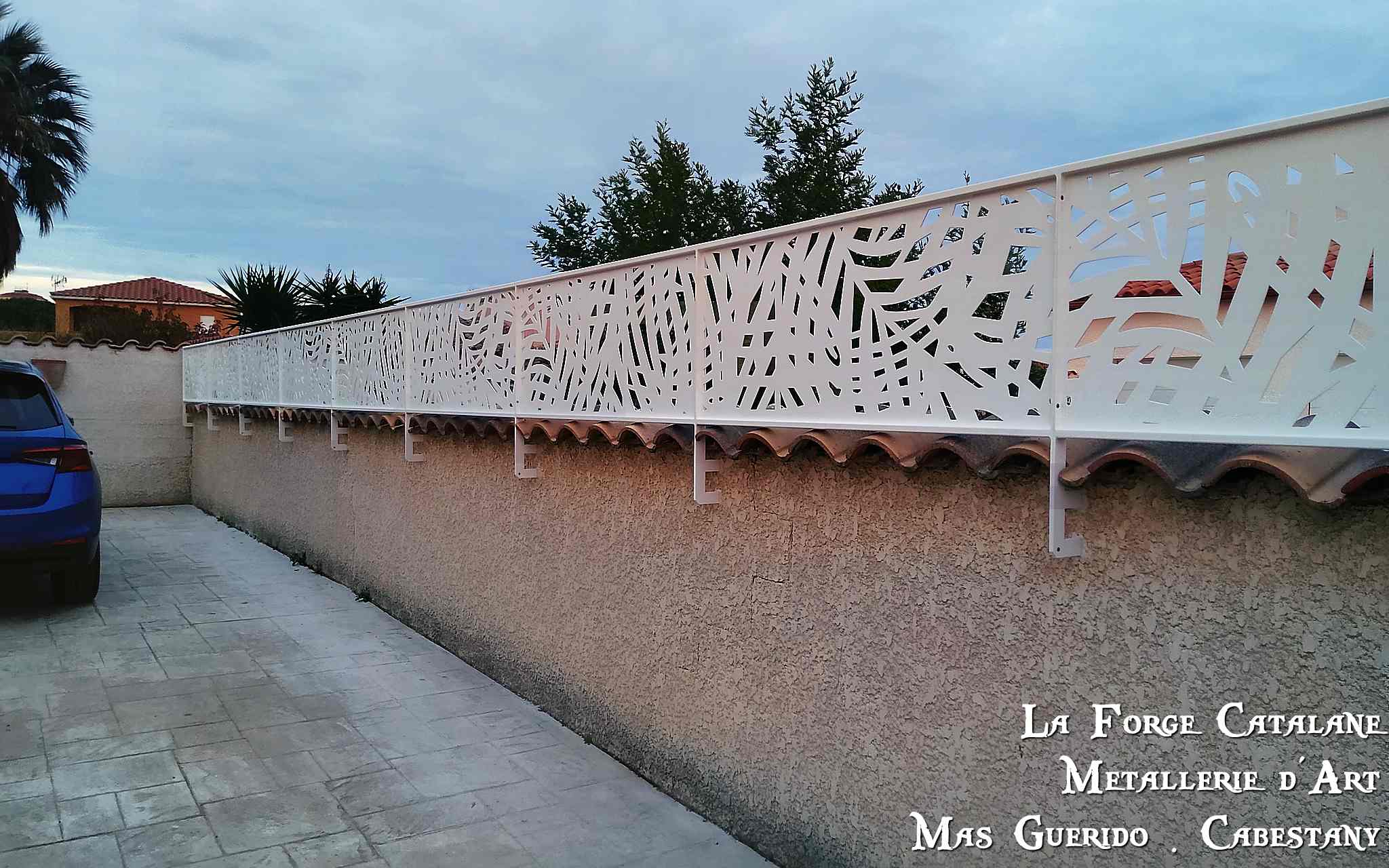 rehausse de cloture en decoupe laser forge catalane.jpg